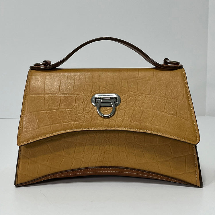 tan curve couture handbag