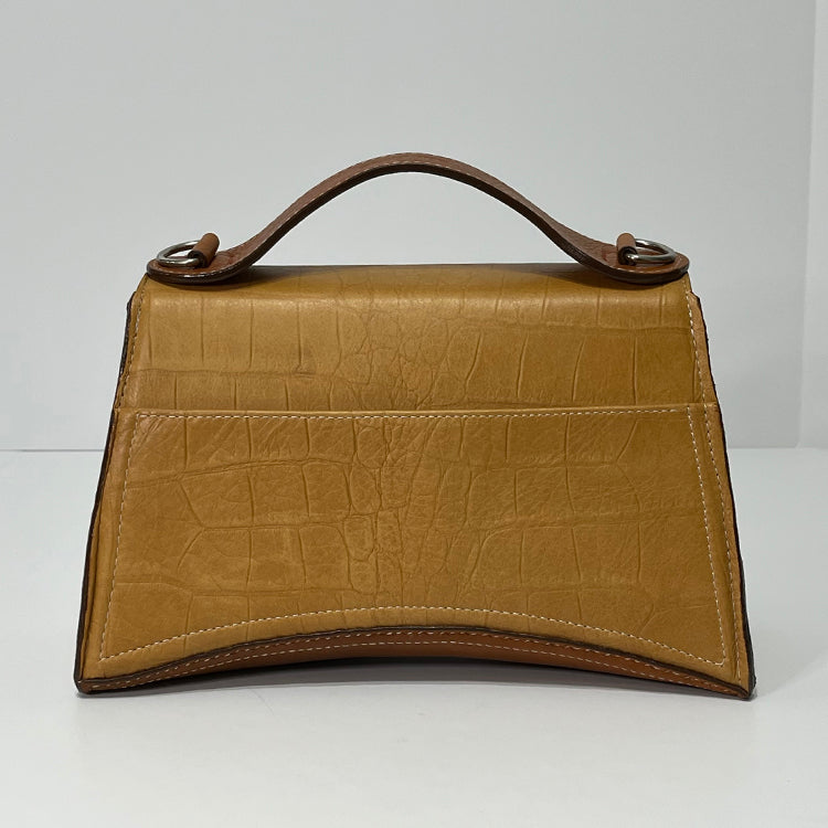 tan curve couture handbag