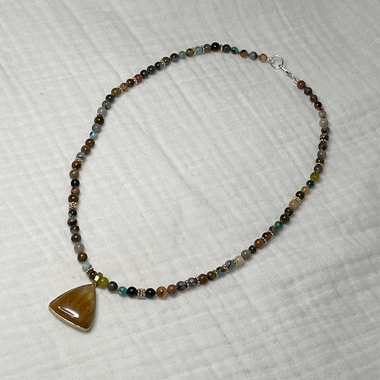 jasper triangular pendant on beaded necklace