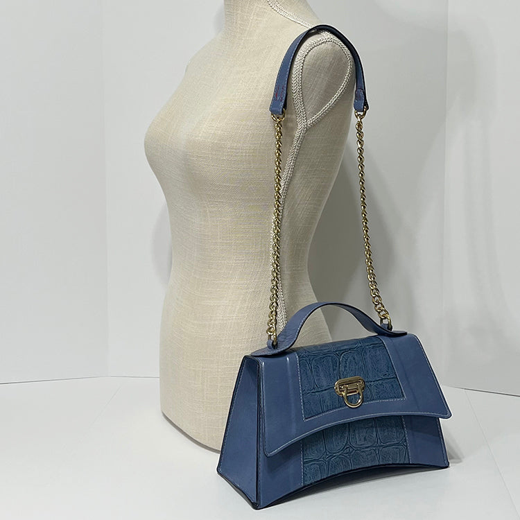 periwinkle curve couture handbag