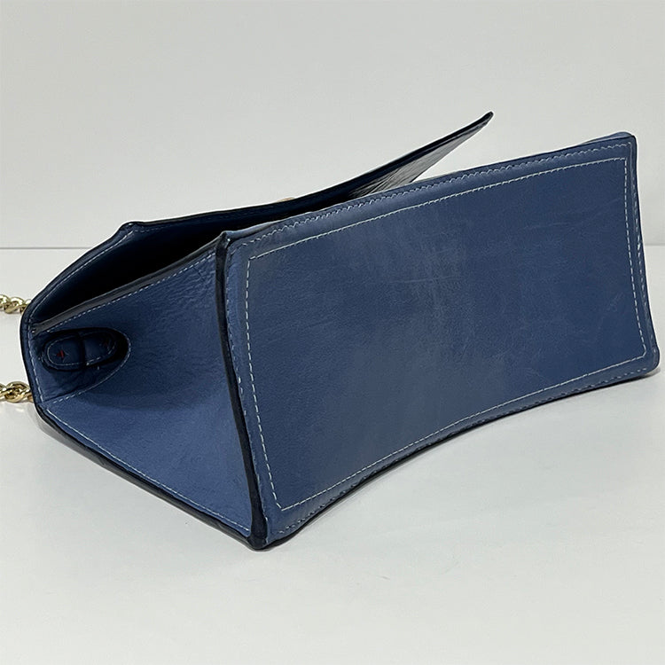periwinkle curve couture handbag