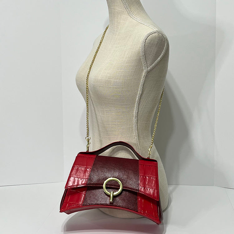 red curve couture handbag