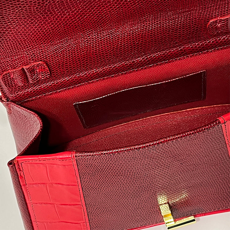red curve couture handbag
