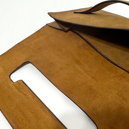 tan leather clutch