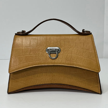 tan curve couture handbag