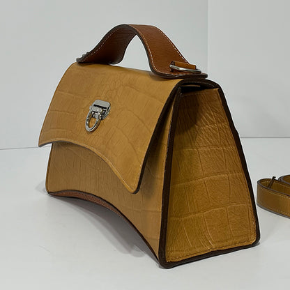 tan curve couture handbag