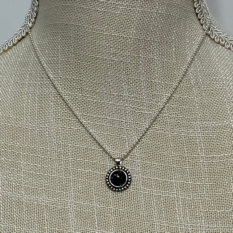 Ethiopian smoked fire opal 1.3ct round pendant