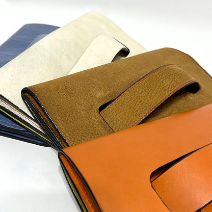 tan leather clutch