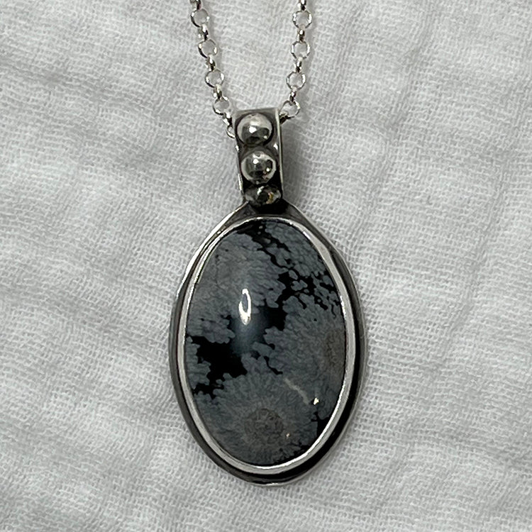 snowflake obsidian pendant