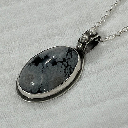 snowflake obsidian pendant