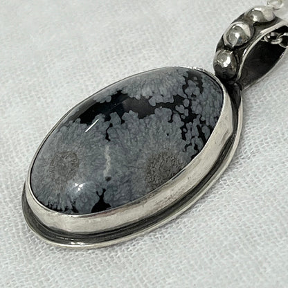 snowflake obsidian pendant