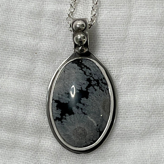 snowflake obsidian pendant