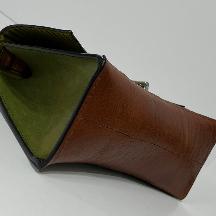 green curve couture handbag