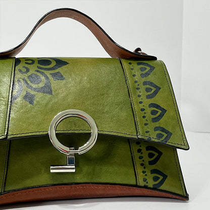 green curve couture handbag