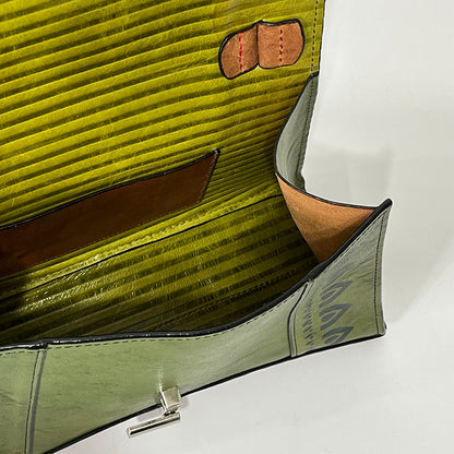 green curve couture handbag