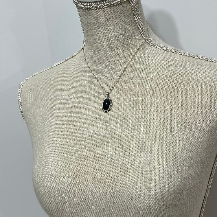 Ethiopian smoked fire opal 5.3ct oval pendant