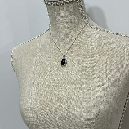 Ethiopian smoked fire opal 5.3ct oval pendant