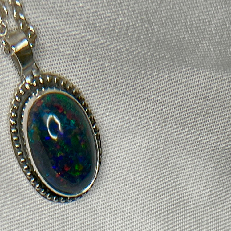 Ethiopian smoked fire opal 5.3ct oval pendant
