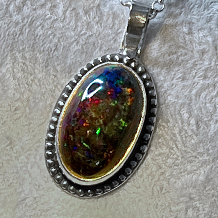 Ethiopian smoked fire opal 5.3ct oval pendant