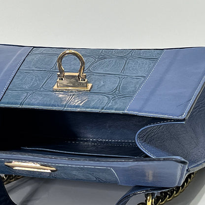 periwinkle curve couture handbag
