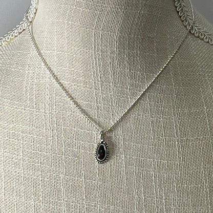 Ethiopian smoked fire opal 1ct oblong pendant
