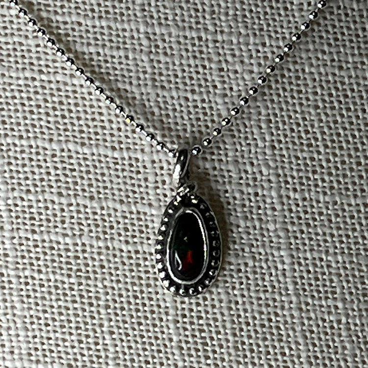 Ethiopian smoked fire opal 1ct oblong pendant