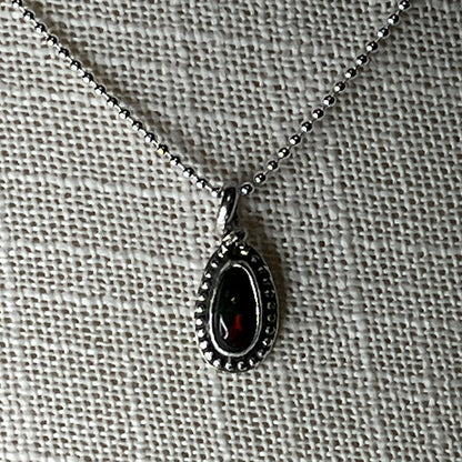 Ethiopian smoked fire opal 1ct oblong pendant