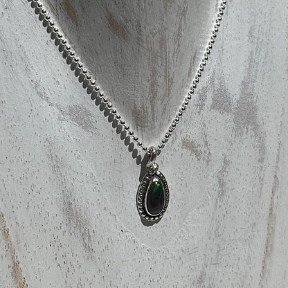 Ethiopian smoked fire opal 1ct oblong pendant