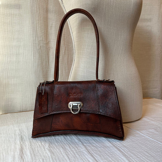 everyday rugged couture handbag