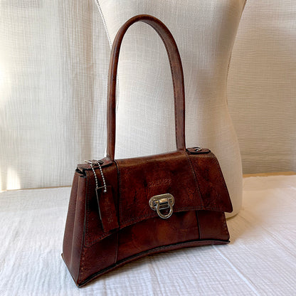 everyday rugged couture handbag
