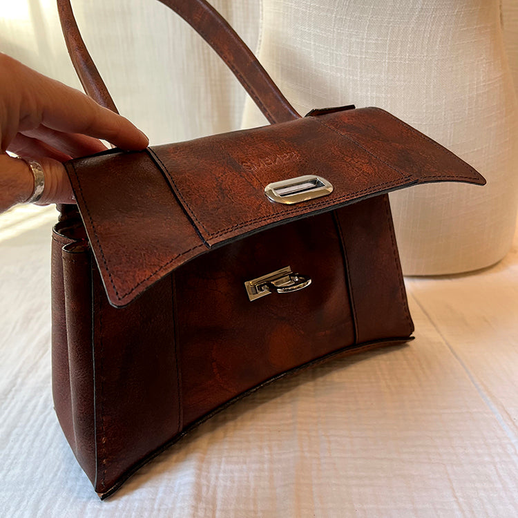 everyday rugged couture handbag