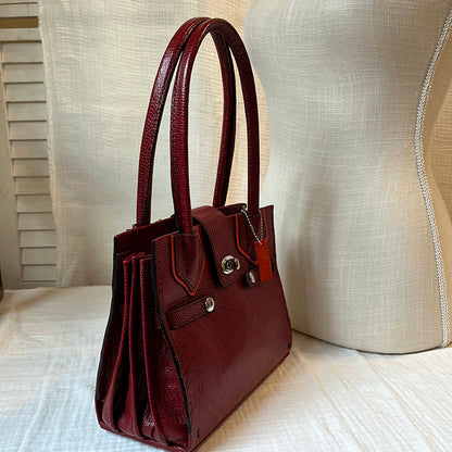 classic couture-style handbag in high fashion red